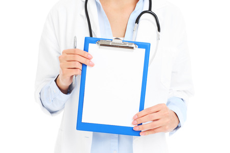 A midsection of doctor holding documents over white backgroundの写真素材