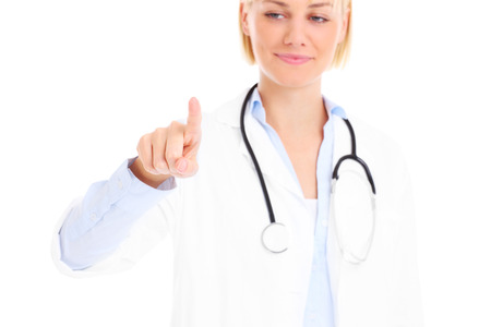 A picture of a young doctor pressing a button over white backgroundの写真素材
