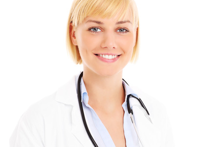 A picture of a young doctor smiling over white backgroundの写真素材