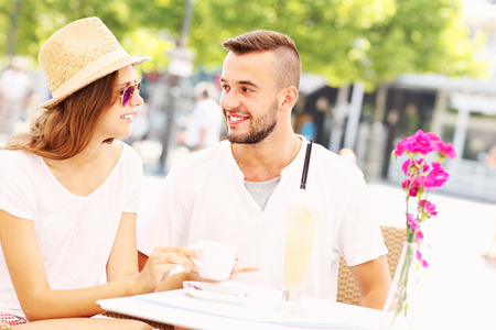 A picture of a young couple having coffeeの写真素材