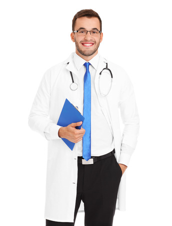 A portrait of a confident young doctor holding a file over white backgroundの写真素材