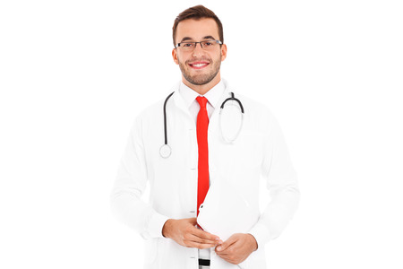 A picture of a doctor holding laptop over white backgroundの写真素材