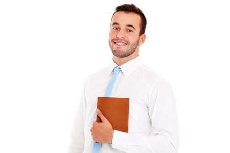 A picture of a happy businessman with documents over white backgroundの写真素材