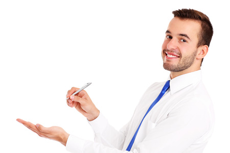 A picture of a happy businessman presenting something over white backgroundの写真素材