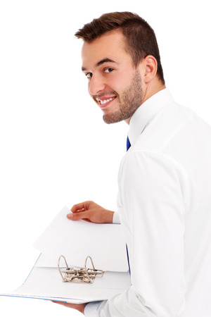 A picture of a happy businessman holding documentsの写真素材