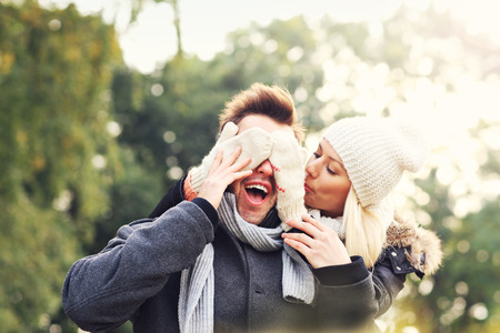 A picture of a young couple having fun in the parkの写真素材