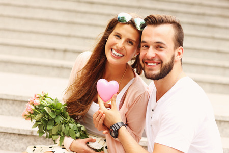 A picture of a young romantic couple on a date in the cityの写真素材