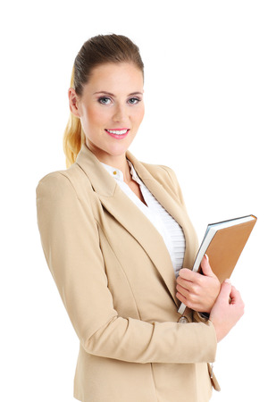 Picture of businesswoman with agenda over white backgroundの写真素材