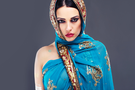 Portrait of beautiful mysterious oriental woman