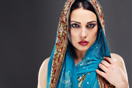 Portrait of beautiful mysterious oriental womanの写真素材