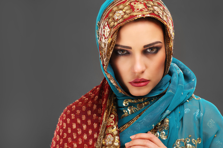 Portrait of beautiful mysterious oriental womanの写真素材