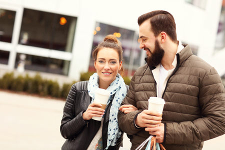 Picture of young couple with shopping bagsの写真素材