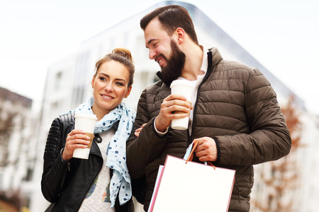 Picture of young couple with shopping bagsの写真素材