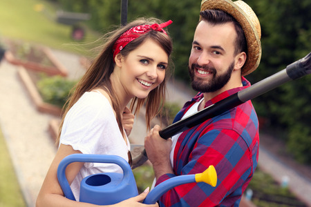Picture of young couple working in the gardenの写真素材