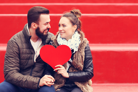 Picture of romantic couple having fun with heartの写真素材