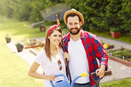 Picture of young couple working in the gardenの写真素材