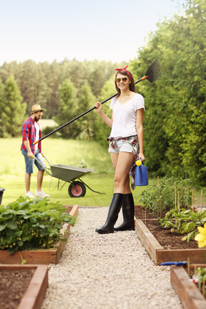 Picture of young couple working in the gardenの写真素材