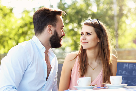 Picture of young couple in restaurantの写真素材