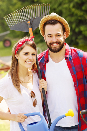 Picture of young couple working in the gardenの写真素材