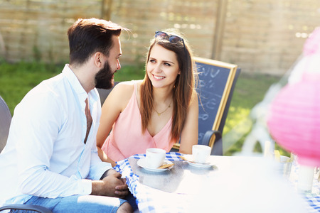 Picture of young couple in restaurantの写真素材