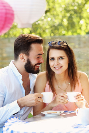Picture of young couple in restaurantの写真素材