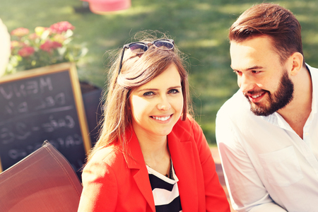 Picture of young couple in restaurantの写真素材