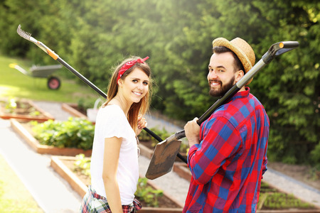 Picture of young couple working in the gardenの写真素材