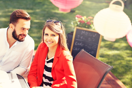 Picture of young couple in restaurantの写真素材