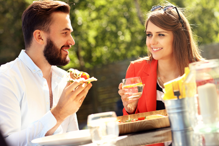 Picture of young couple in restaurantの写真素材
