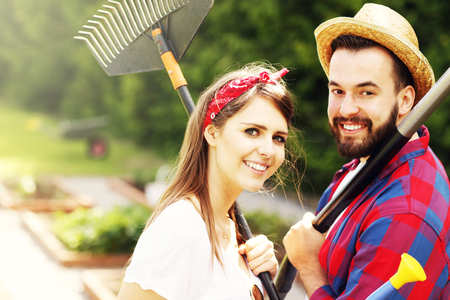 Picture of young couple working in the gardenの写真素材