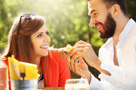 Picture of young couple in restaurantの写真素材