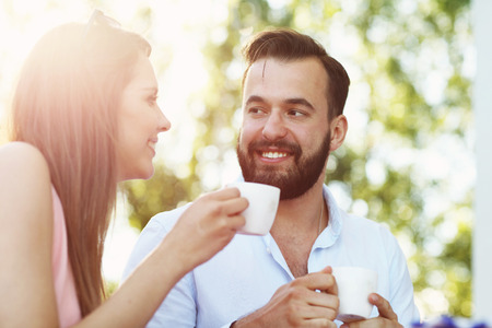 Picture of romantic couple in cafeの写真素材