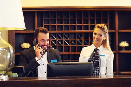 Picture of two receptionists at workの写真素材