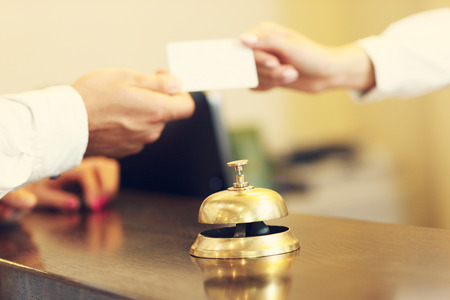 Picture of guests getting key card in hotelの写真素材