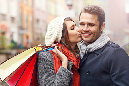 Picture showing young couple shopping in the cityの写真素材