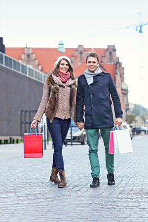 Picture showing young couple shopping in the cityの写真素材