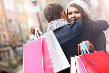 Picture showing young couple shopping in the cityの写真素材