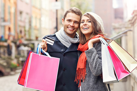 Picture showing young couple shopping in the cityの写真素材