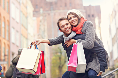 Picture showing young couple shopping in the cityの写真素材