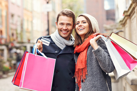 Picture showing young couple shopping in the cityの写真素材