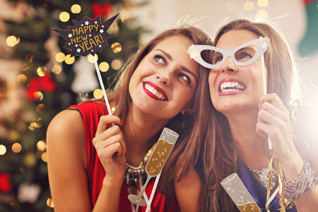 Picture showing best friends celebrating New Yearの写真素材