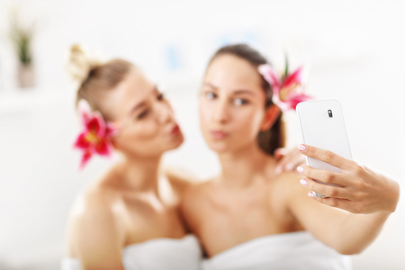 Two beautiful women in spaの写真素材