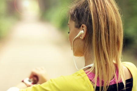 Woman jogging in the forestの写真素材