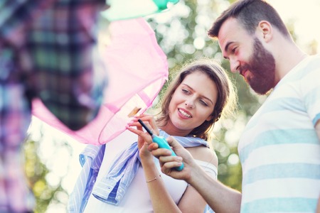 Group of friends floating chinese lanternsの写真素材