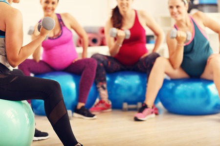 Group of pregnant women during fitness classの写真素材