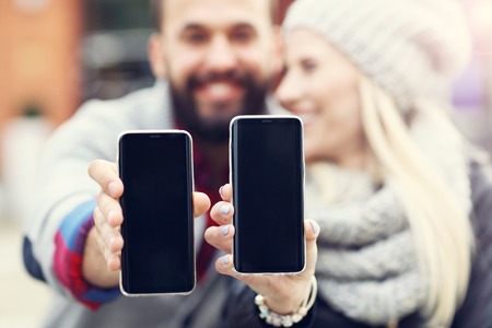 Picture showing happy young couple dating in the cityの写真素材