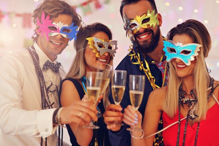 Picture showing group of friends having fun with at Partyの写真素材