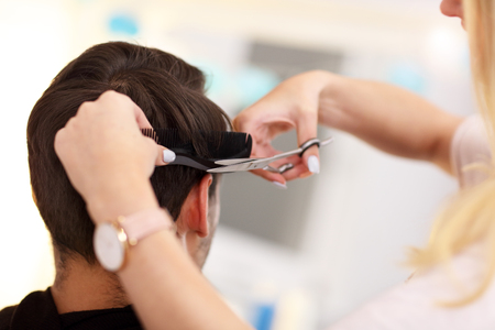 Adult man at the hair salonの写真素材