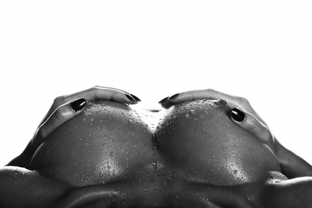 Sensual nude female body with drops of water and with place for textの写真素材