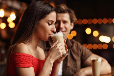 Cute couple on a date at the cafeの写真素材